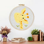 Finished cute giraffe artwork displayed on a wall