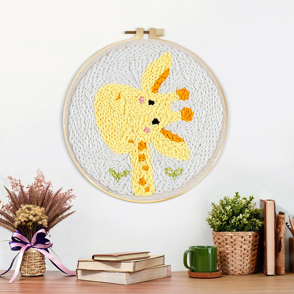 Finished cute giraffe artwork displayed on a wall