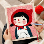 Creating handmade cute girl in red headscarf punch needle artwork