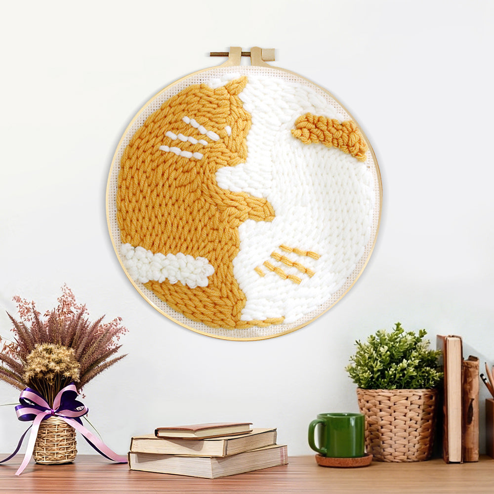 Finished cute golden cat artwork displayed on a wall