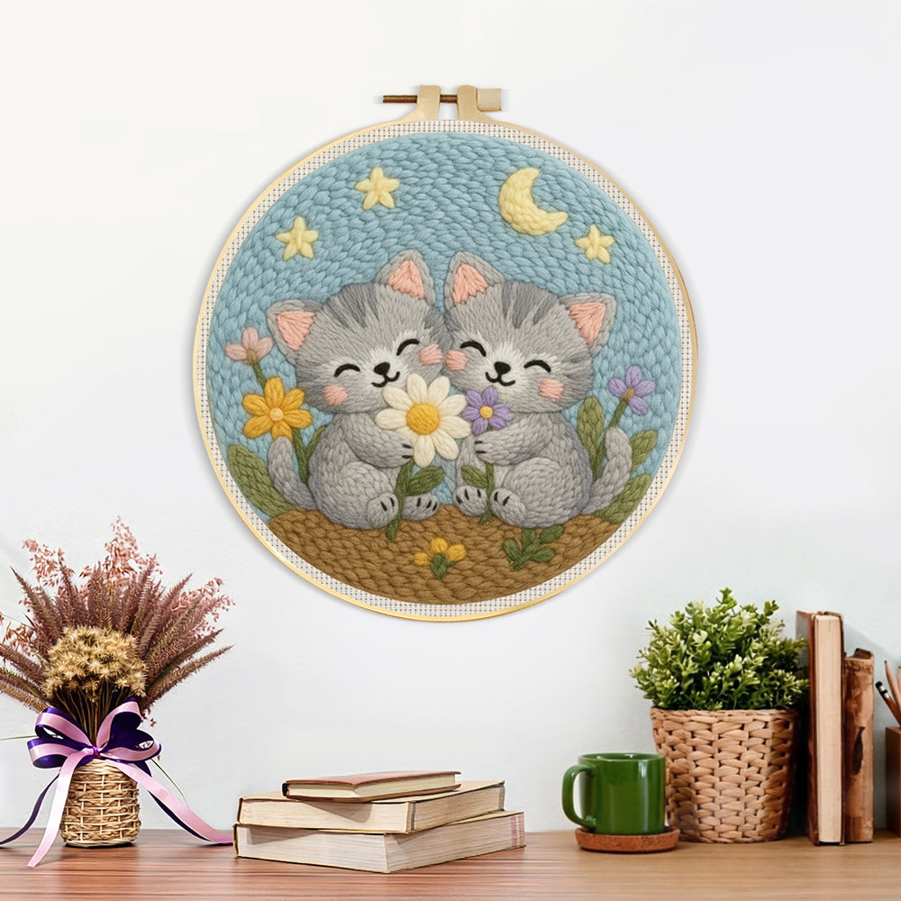 Finished cute grey kittens and wildflowers artwork displayed on a wall