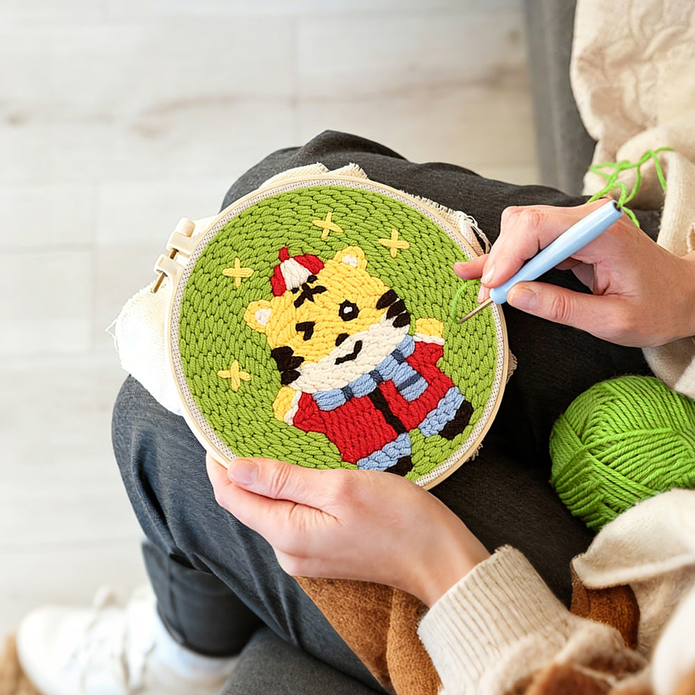 Creating handmade cute happy tiger punch needle artwork