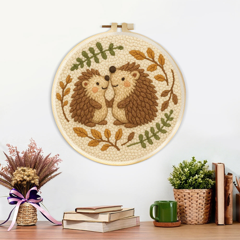 Finished cute hedgehog couple artwork displayed on a wall