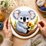 Creating the cute koala holding a flower wool painting by hand with a felting needle