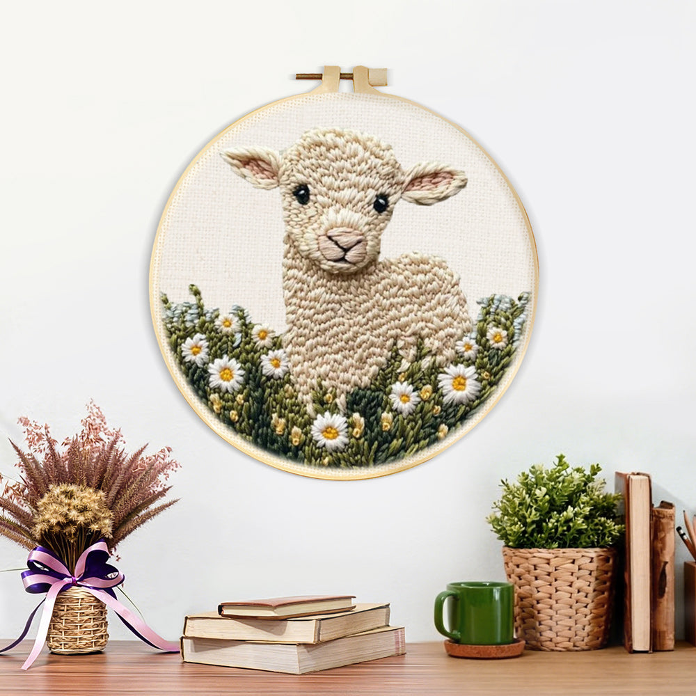 Finished cute lamb in daisy field artwork displayed on a wall