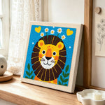 Cute lion with daisies punch needle artwork displayed on a table