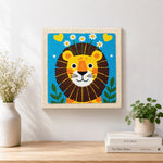 Finished cute lion with daisies artwork displayed on a wall
