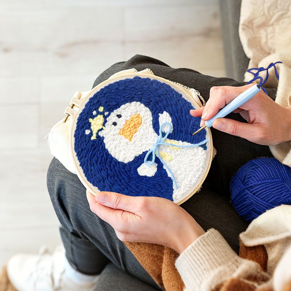 Creating handmade cute little duck punch needle artwork
