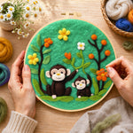 Creating the cute monkey and baby wool painting by hand with a felting needle