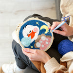 Creating handmade cute nap duck punch needle artwork