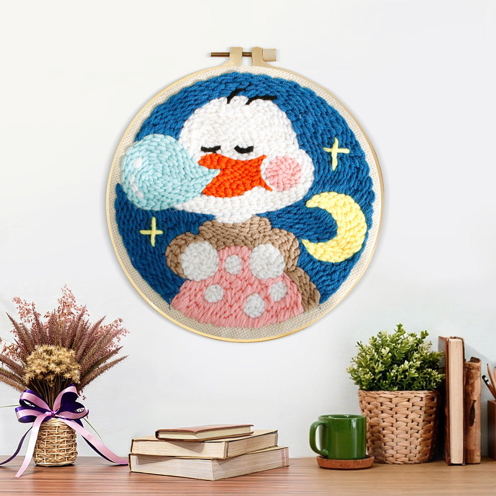 Finished cute nap duck artwork displayed on a wall