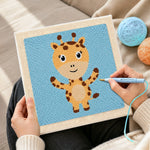 Creating handmade cute open-arms giraffe punch needle artwork