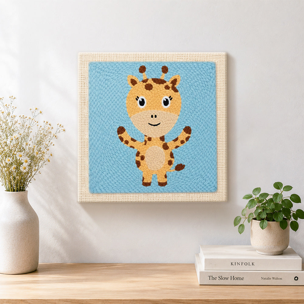 Finished cute open-arms giraffe artwork displayed on a wall