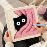 Creating handmade cute peeking kitten in pink blanket punch needle artwork