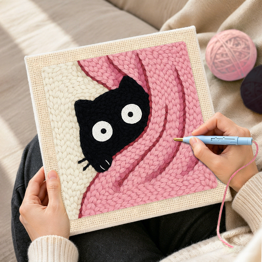 Creating handmade cute peeking kitten in pink blanket punch needle artwork
