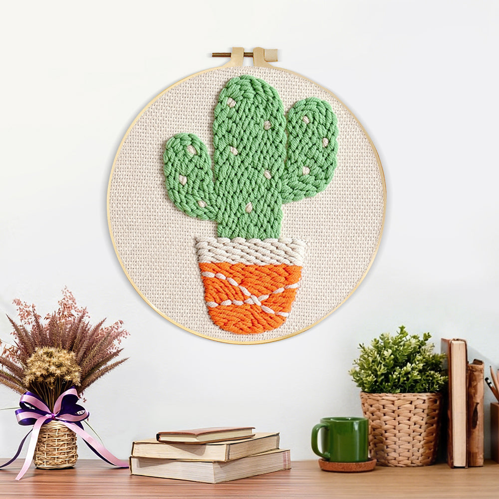 Finished cute potted twin cactus artwork displayed on a wall