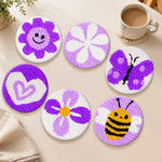 Cute purple bee, flower and butterfly punch needle coasters used for home decoration
