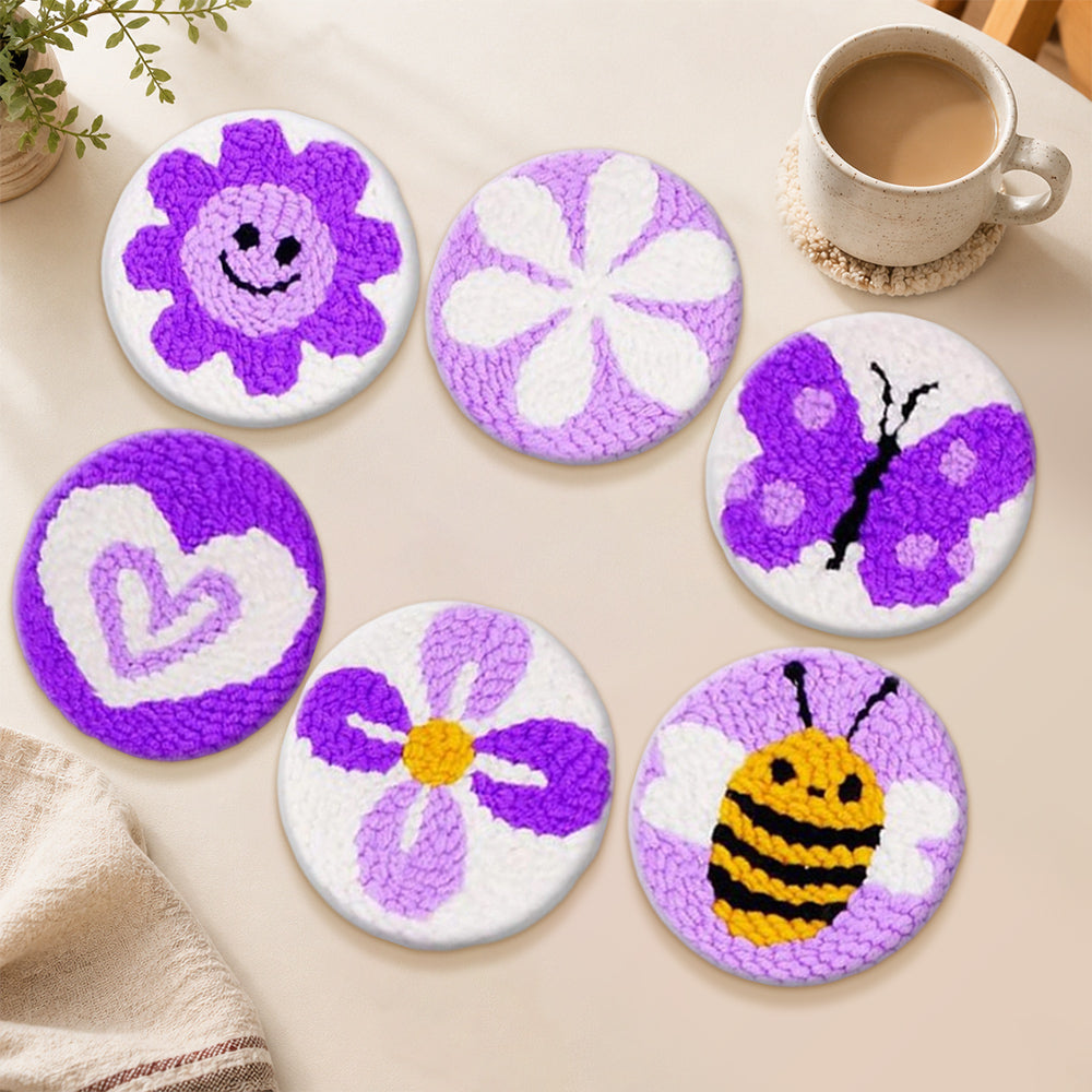 Cute purple bee, flower and butterfly punch needle coasters used for home decoration