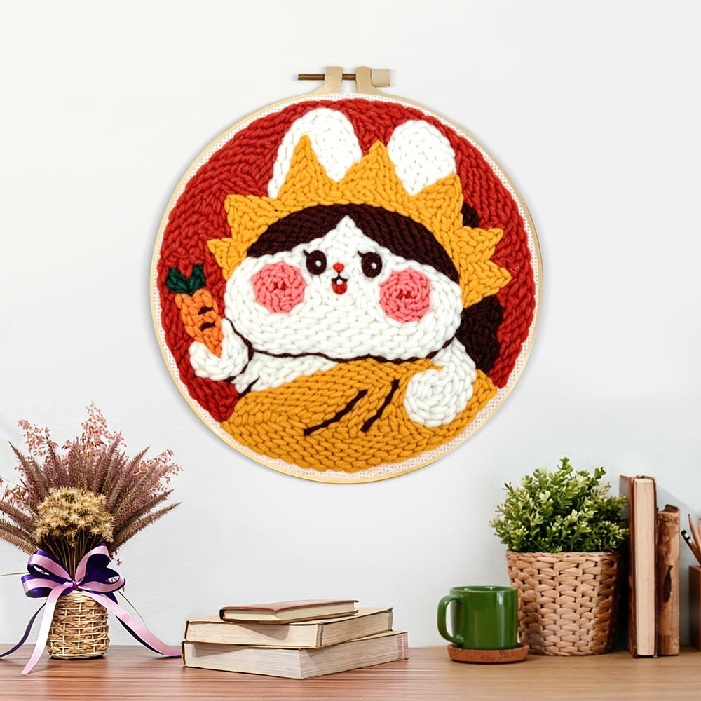 Finished cute rabbit with crown and carrot artwork displayed on a wall