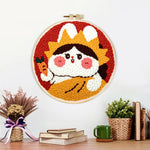 Finished cute rabbit with crown and carrot artwork displayed on a wall