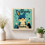 Finished cute reader bunny artwork displayed on a wall