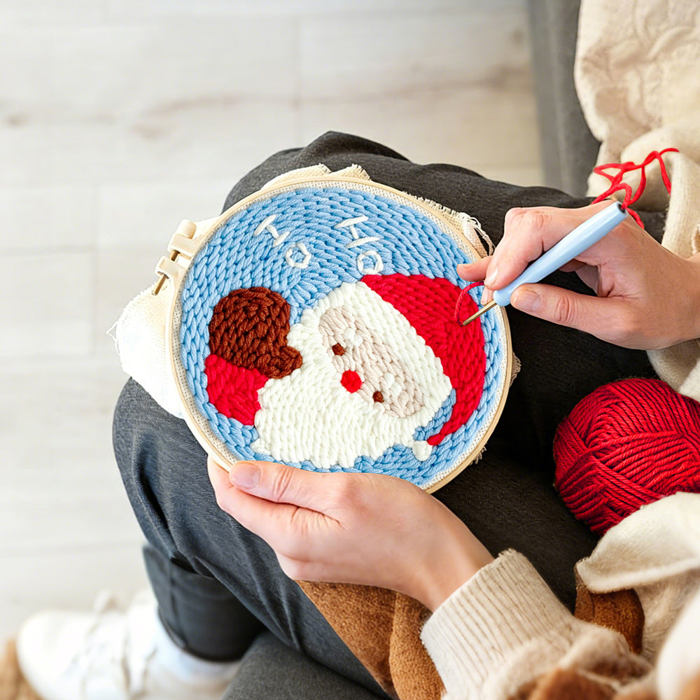 Creating handmade cute santa claus “ho ho” punch needle artwork
