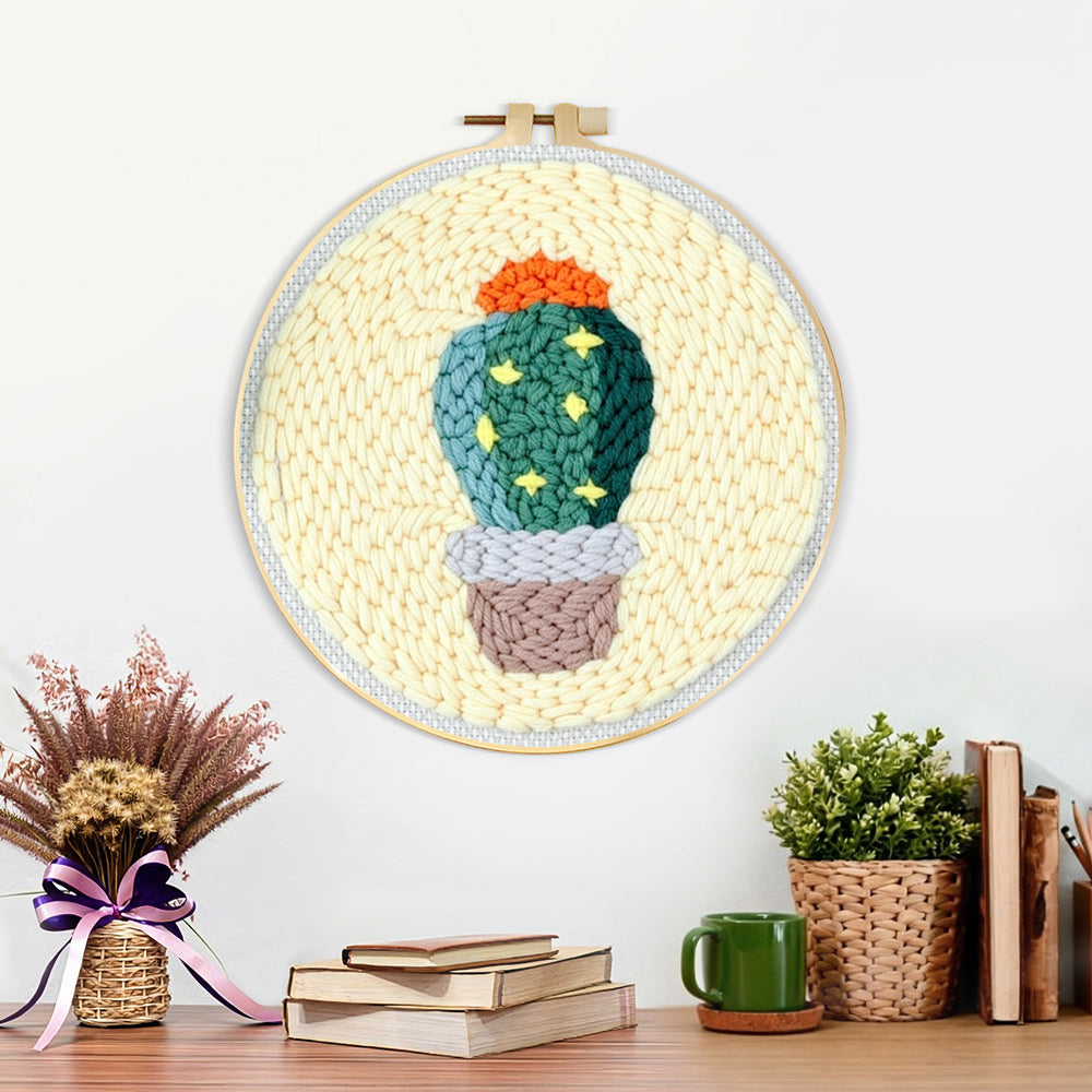Finished cute starry cactus artwork displayed on a wall