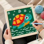 Creating handmade cute swimming sea turtle punch needle artwork