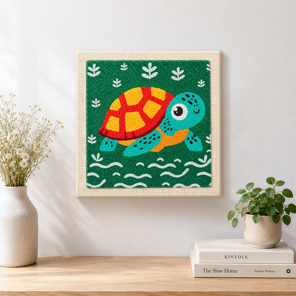 Finished cute swimming sea turtle artwork displayed on a wall