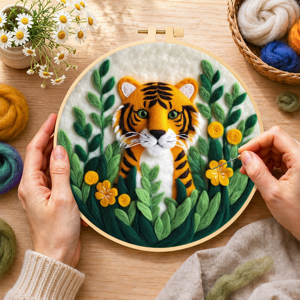 Creating the cute tiger cub in the jungle wool painting by hand with a felting needle