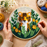 Creating the cute tiger cub in the jungle wool painting by hand with a felting needle