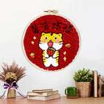Finished cute tiger with "no worries" text artwork displayed on a wall