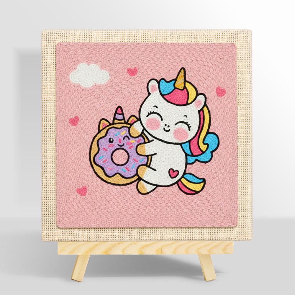 Cute unicorn hugging a donut punch needle kit for beginners
