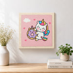 Finished cute unicorn hugging a donut artwork displayed on a wall