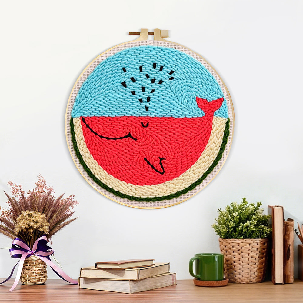 Finished cute watermelon slice character artwork displayed on a wall