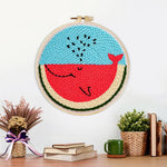 Finished cute watermelon slice character artwork displayed on a wall