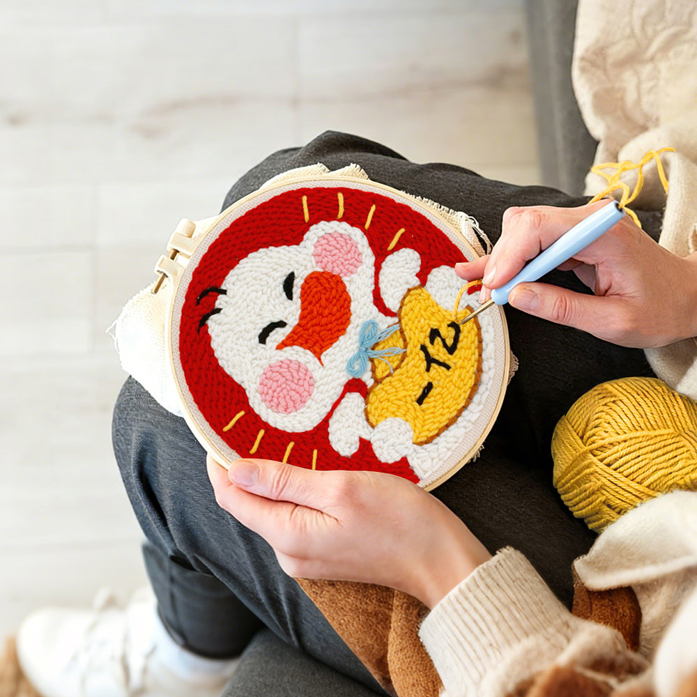 Creating handmade cute white duck holding lucky gold bag punch needle artwork