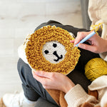Creating handmade cute yellow lion face punch needle artwork