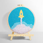 Cute yellow rocket launch punch needle kit for beginners