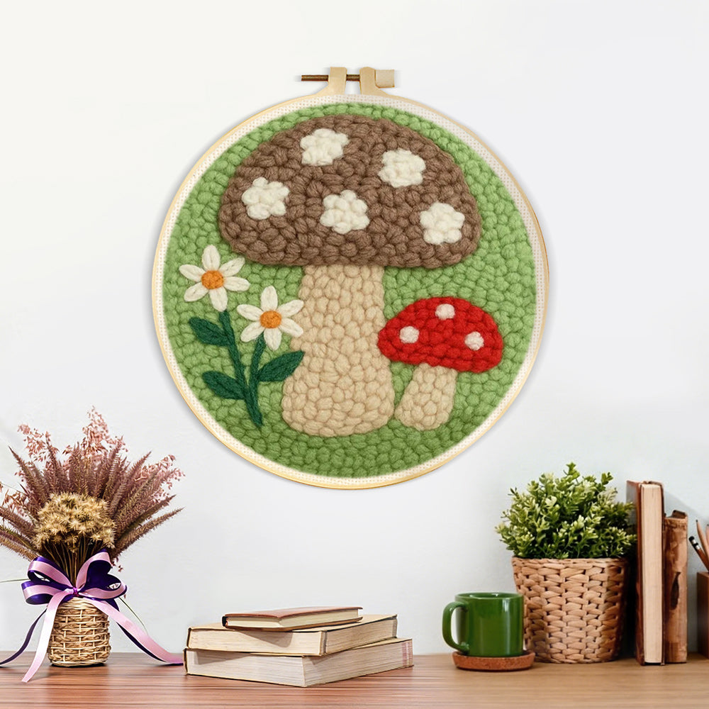 Finished daisies and mushrooms artwork displayed on a wall
