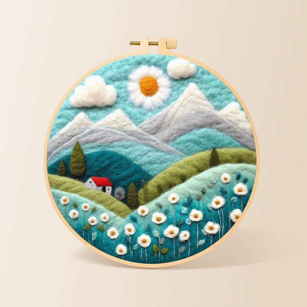 Daisy sun and red cottage in the alps needle felting kit for beginners with a round wooden frame