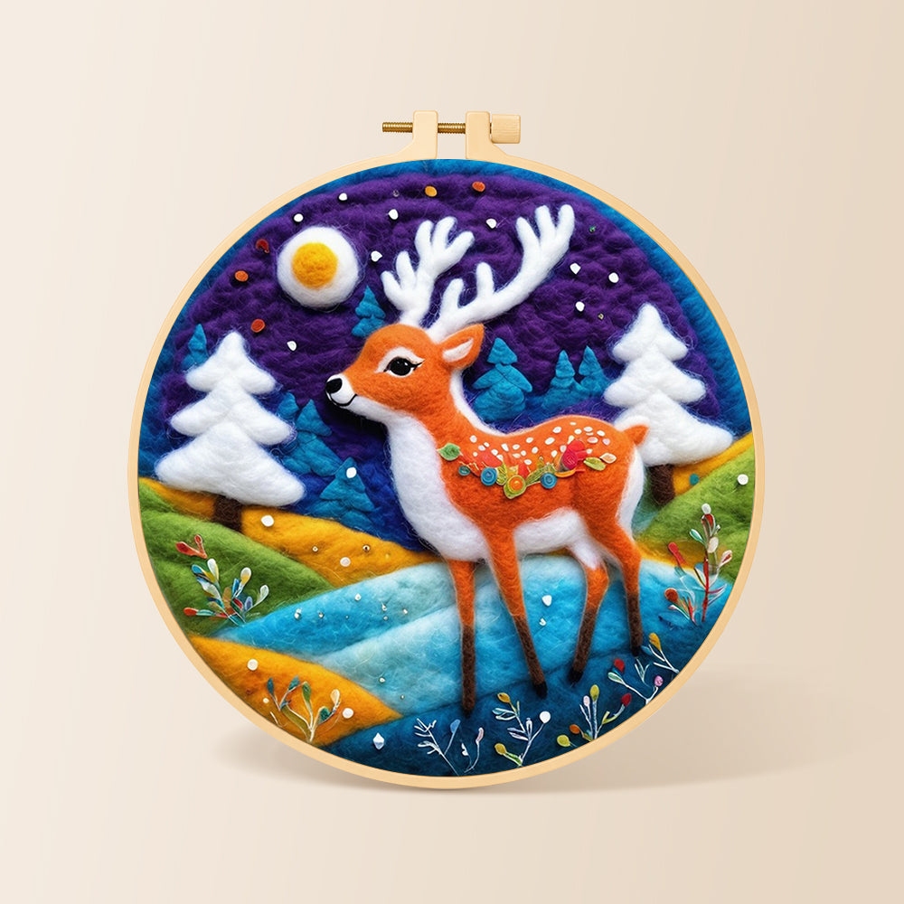Deer with white antlers in purple night needle felting kit for beginners with a round wooden frame
