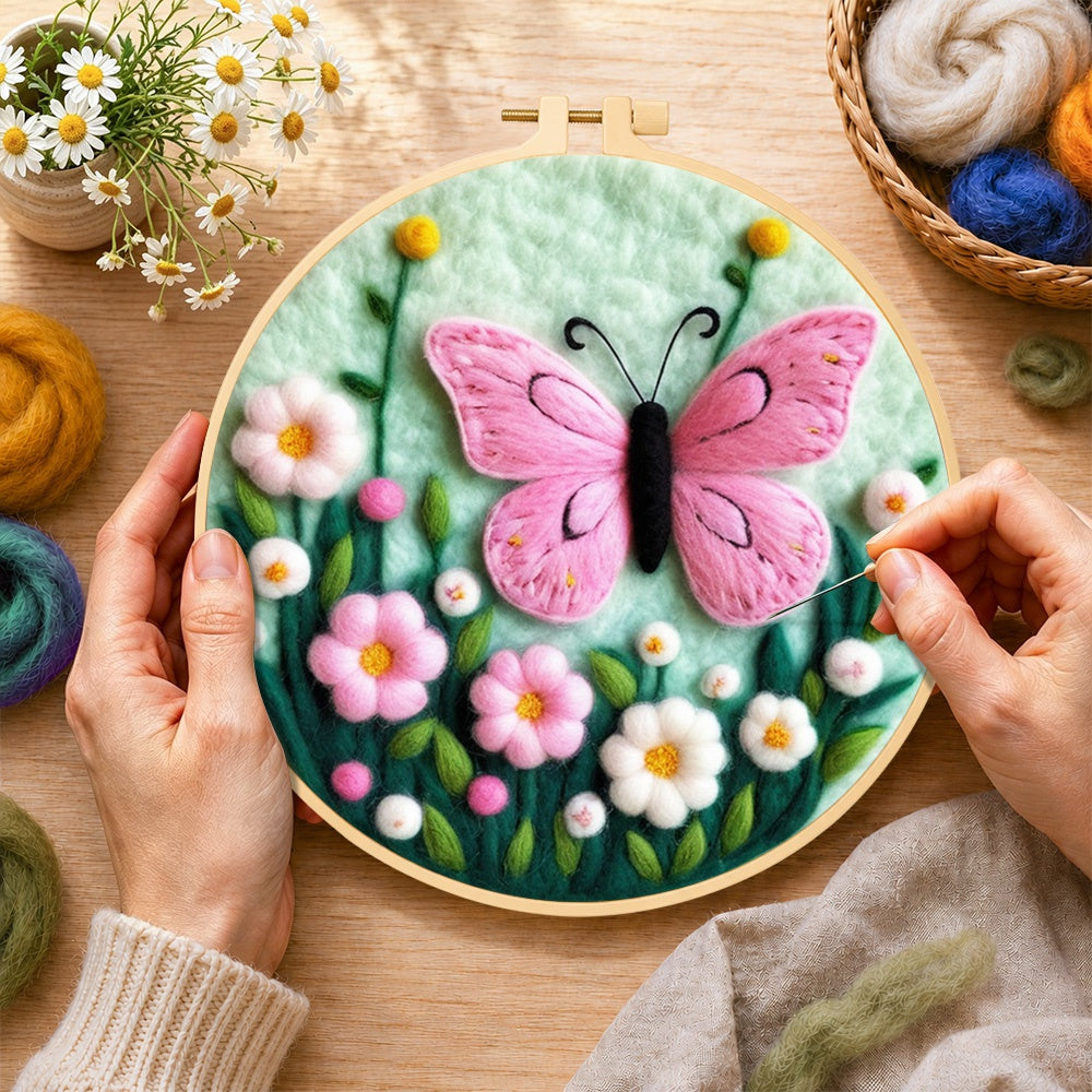 Creating the delicate pink butterfly and flowers wool painting by hand with a felting needle