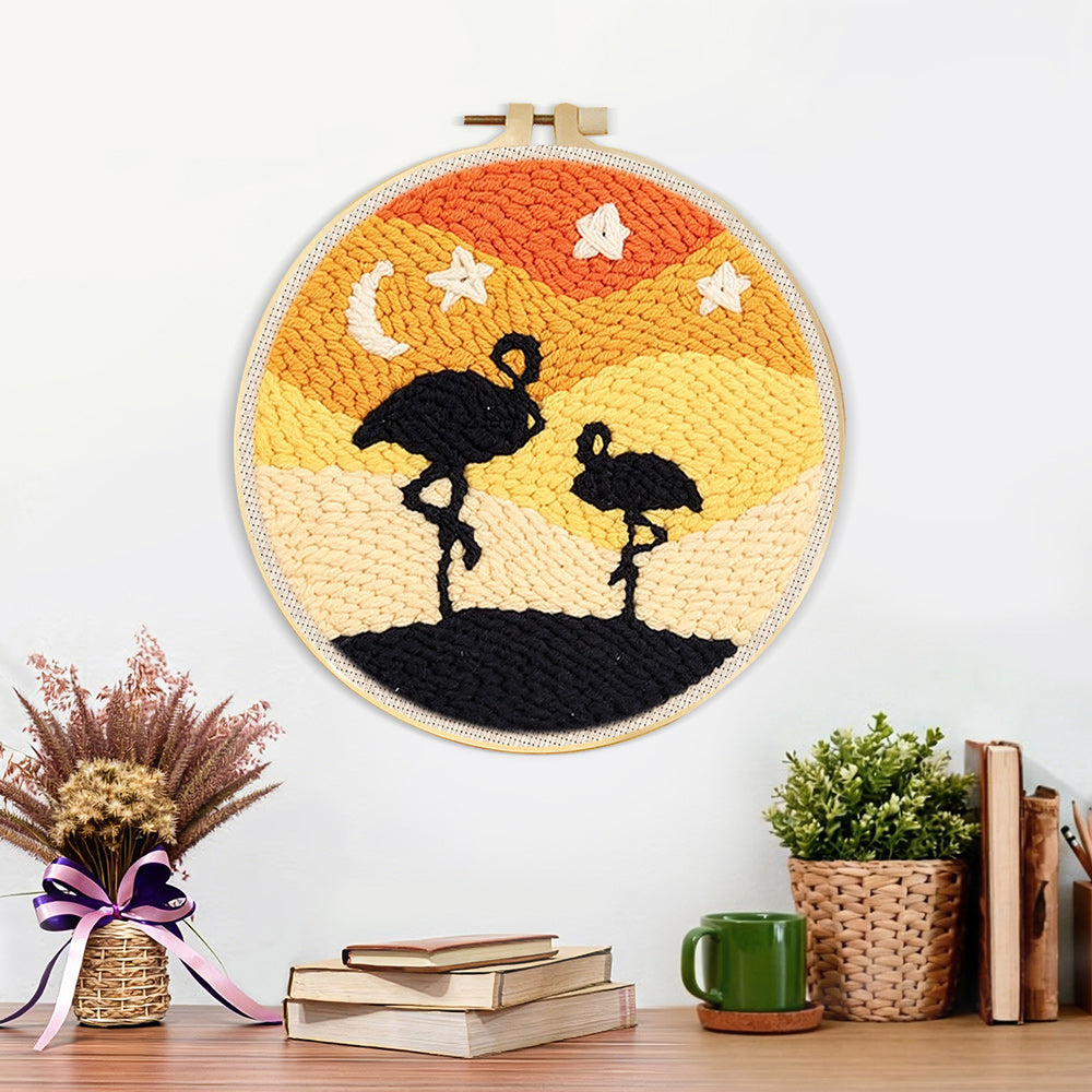 Finished desert flamingos at night artwork displayed on a wall