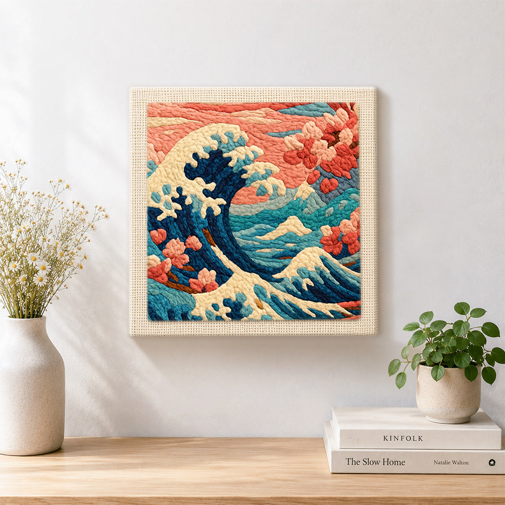 Finished dramatic waves and cherry blossoms artwork displayed on a wall