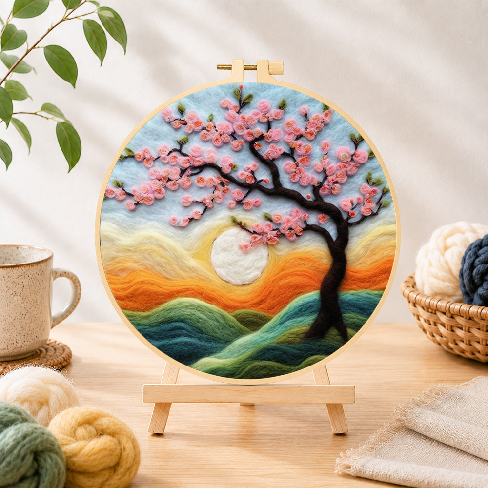Finished dreamy cherry tree at sunset needle felting displayed on a wooden easel