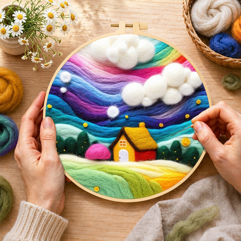Creating the dreamy cottage under the rainbow aurora wool painting by hand with a felting needle