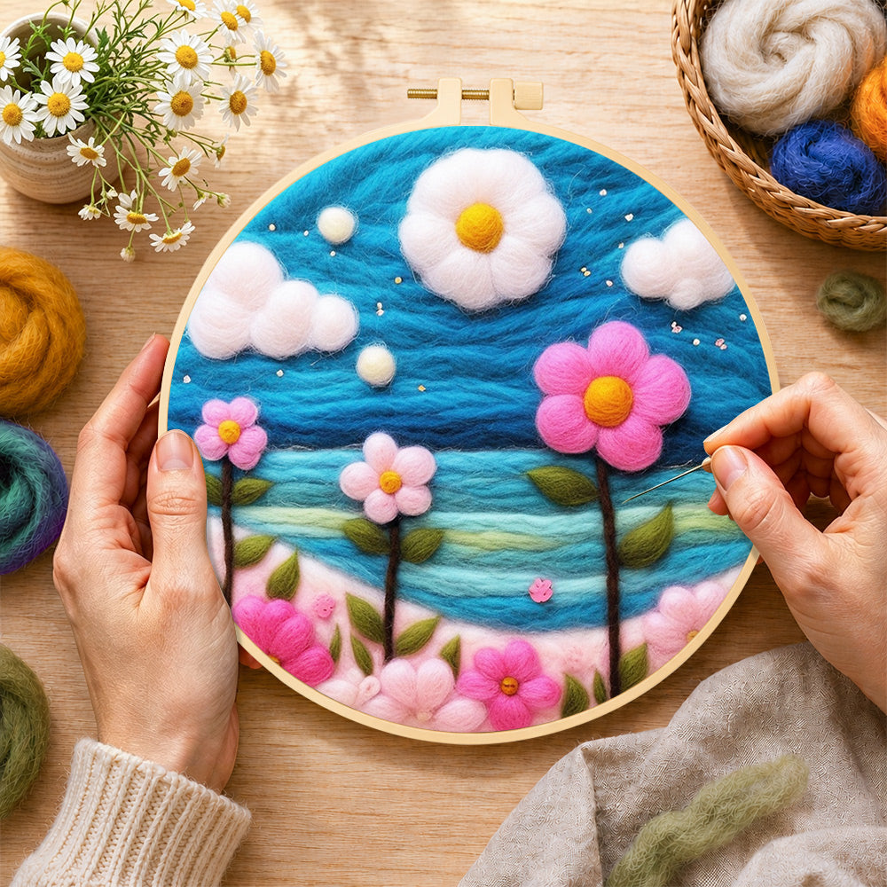 Creating the dreamy pink flowers under the blue sky wool painting by hand with a felting needle