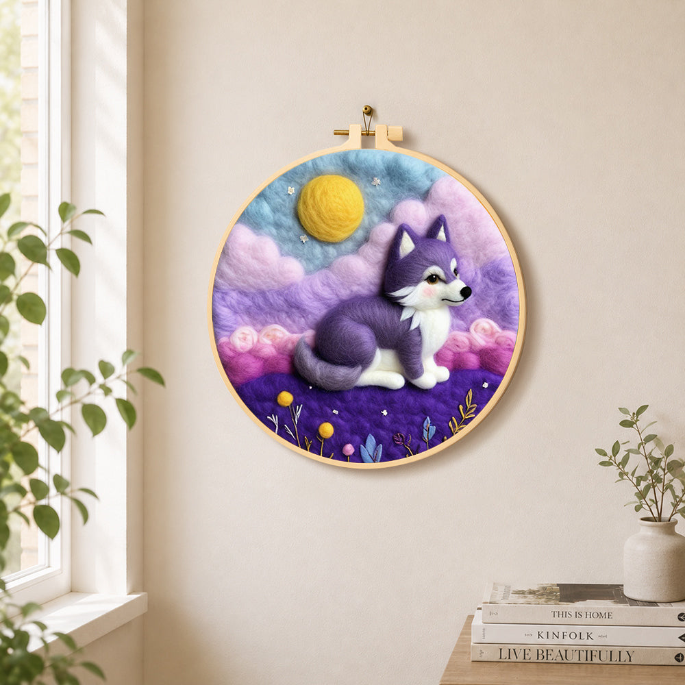 Dreamy purple wolf needle felt wall art displayed in a bright home interior