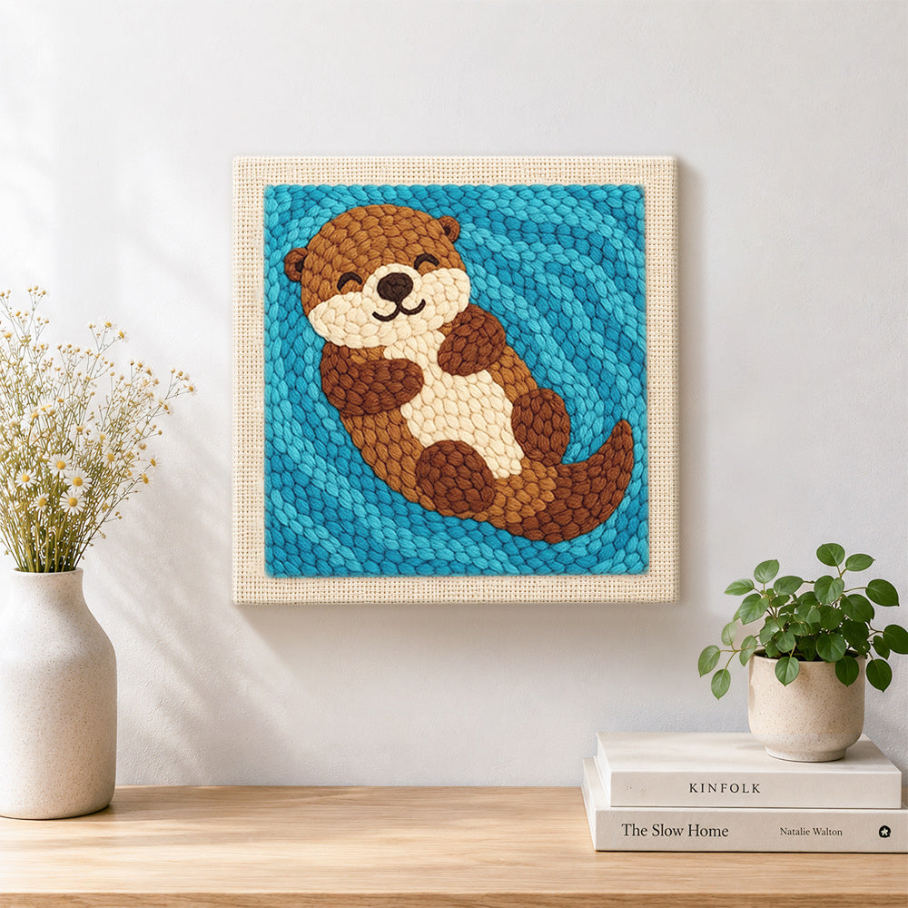 Finished dreamy swimming otter artwork displayed on a wall